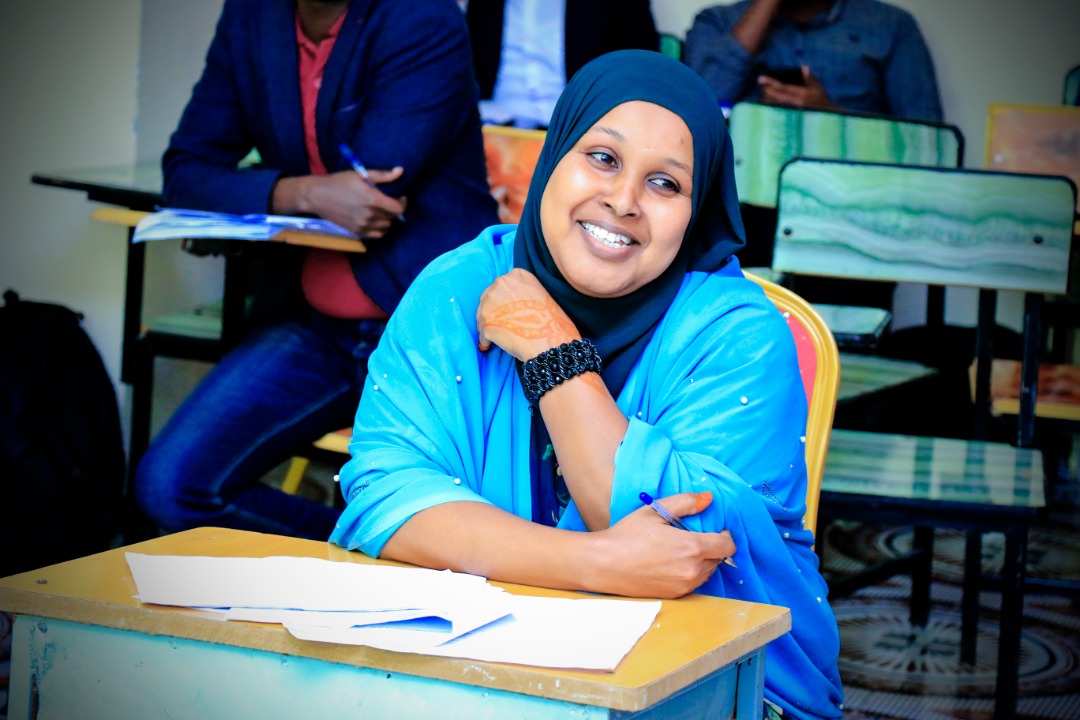 A student reacting to questions from the panelists, at Amoud University School of Postgraduate Studies and Research (ASPGSR), during the Research Proposal Viva Voce conducted On Thursday, January 24th, 2020 at Amoud University School of Postgraduate Studies and Research (ASPGSR), Hargeisa Campus premises.