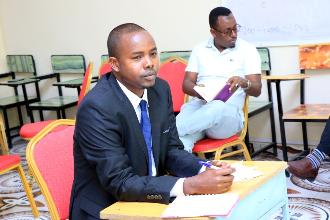 A student keenly listening to questions from the panelists, at Amoud University School of Postgraduate Studies and Research (ASPGSR), during the Research Proposal Viva Voce conducted On Thursday, January 24th, 2020 at Amoud University School of Postgraduate Studies and Research (ASPGSR), Hargeisa Campus