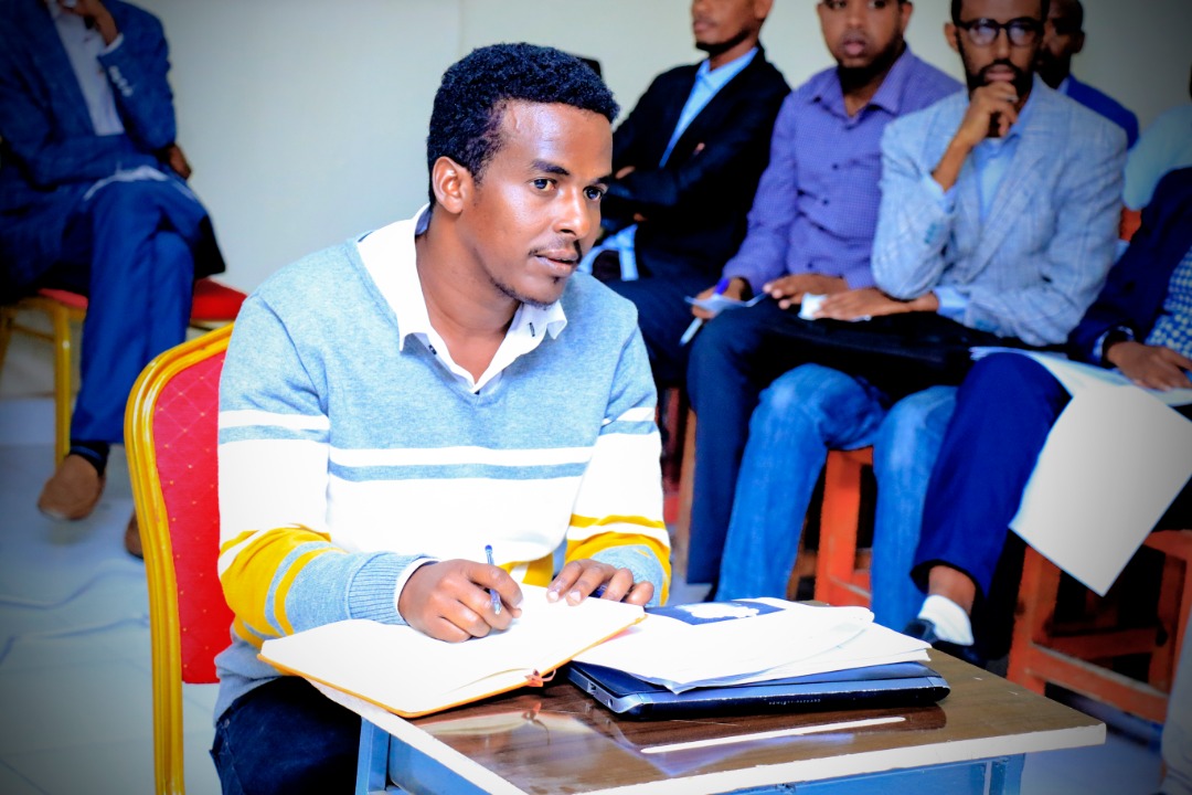 A student keenly listening to questions from the panelists, at Amoud University School of Postgraduate Studies and Research (ASPGSR), during the Research Proposal Viva Voce conducted on Monday, January 27th, 2020 at Amoud University School of Postgraduate Studies and Research (ASPGSR), Borama Campus.