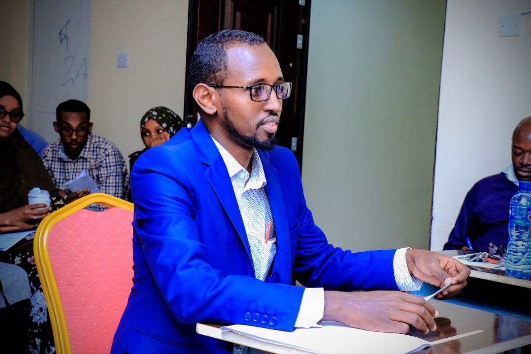 A student keenly listening to questions from the panelists, at Amoud University School of Postgraduate Studies and Research (ASPGSR), during the Research Proposal Viva Voce conducted On Thursday, January 23rd, 2020 at Amoud University School of Postgraduate Studies and Research (ASPGSR), Hargeisa Campus premises. 