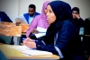 A student reacting to questions from the panelists, at Amoud University School of Postgraduate Studies and Research (ASPGSR), during the Research Proposal Viva Voce conducted on Monday, January 27th, 2020 at Amoud University School of Postgraduate Studies and Research (ASPGSR), Borama Campus premises.